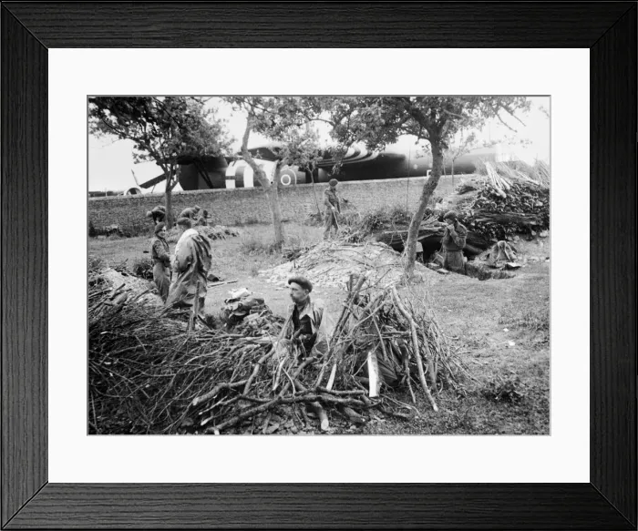 Framed Print : Gliders troops dig positions ahead of a field in which they were landed