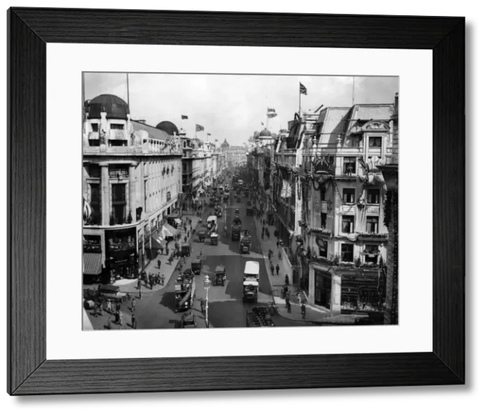 Framed Print : Regent Street prepares for the King and Queen. A view of Regent Street gaily decorated Framed Print : Regent Street prepares for the King and Queen. A view of Regent Street gaily decorated