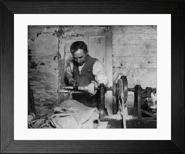 Framed Print : A man making stone models from rock, Cornwall. One of the industries of Penzance is Framed Print : A man making stone models from rock, Cornwall. One of the industries of Penzance is