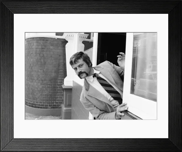 Framed Print : Oliver Reed, British actor, enjoys a few drinks at his local pub, The Dog and Fox Framed Print : Oliver Reed, British actor, enjoys a few drinks at his local pub, The Dog and Fox