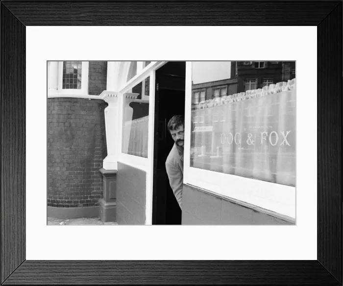 Framed Print : Oliver Reed, British actor, enjoys a few drinks at his local pub, The Dog and Fox Framed Print : Oliver Reed, British actor, enjoys a few drinks at his local pub, The Dog and Fox