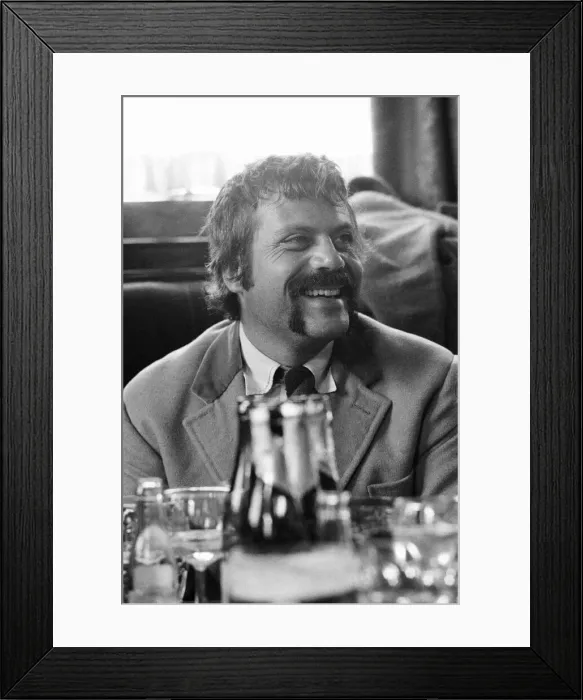 Framed Print : Oliver Reed, British actor, enjoys a few drinks at his local pub, The Dog and Fox Framed Print : Oliver Reed, British actor, enjoys a few drinks at his local pub, The Dog and Fox