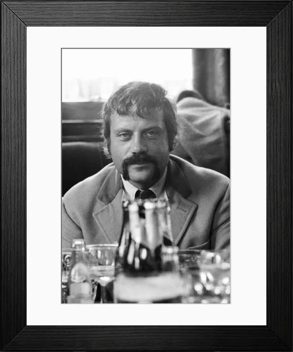 Framed Print : Oliver Reed, British actor, enjoys a few drinks at his local pub, The Dog and Fox Framed Print : Oliver Reed, British actor, enjoys a few drinks at his local pub, The Dog and Fox
