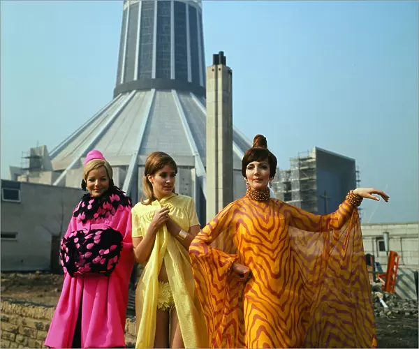 Fashion show in Liverpool. L-R Zandra Fisher, wearing a pink silk coat trimmed with pink