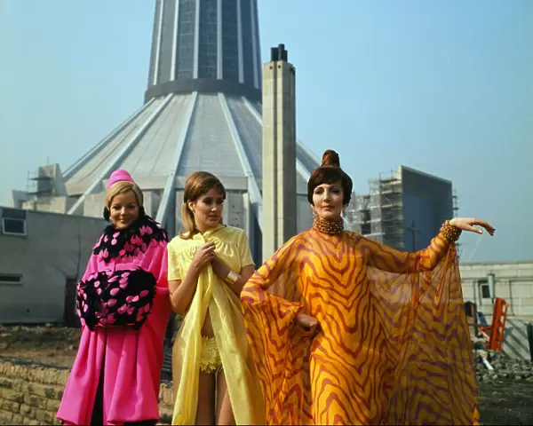 Fashion show in Liverpool. L-R Zandra Fisher, wearing a pink silk coat trimmed with pink