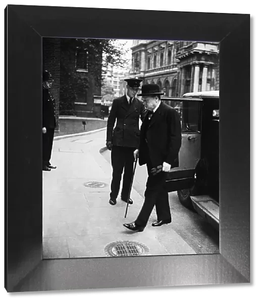 Winston Churchill arriving at Number 10 Downing Street for a Cabinet meeting following