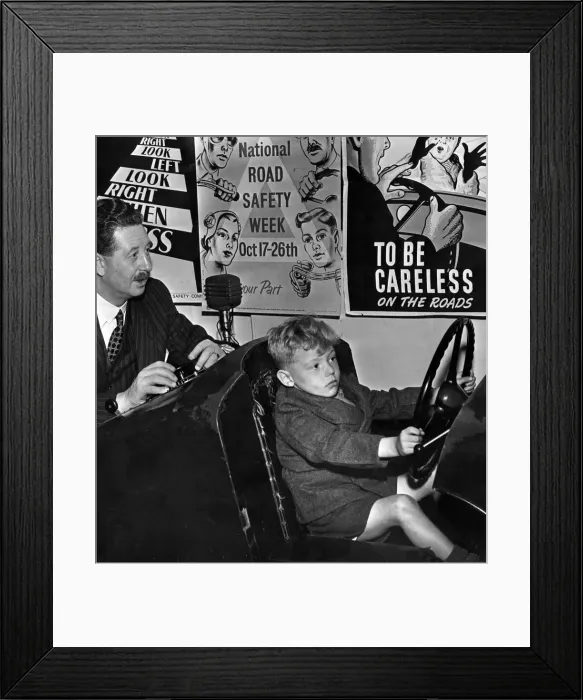 Framed Print : 4-year-old John Burke on a junior trainer at the Liverpool Safety Training Centre Framed Print : 4-year-old John Burke on a junior trainer at the Liverpool Safety Training Centre