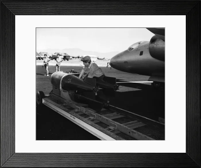 Framed Print : Suez Crisis 1956 RAF ground crew loading bombs onto Canberras on an airfield in