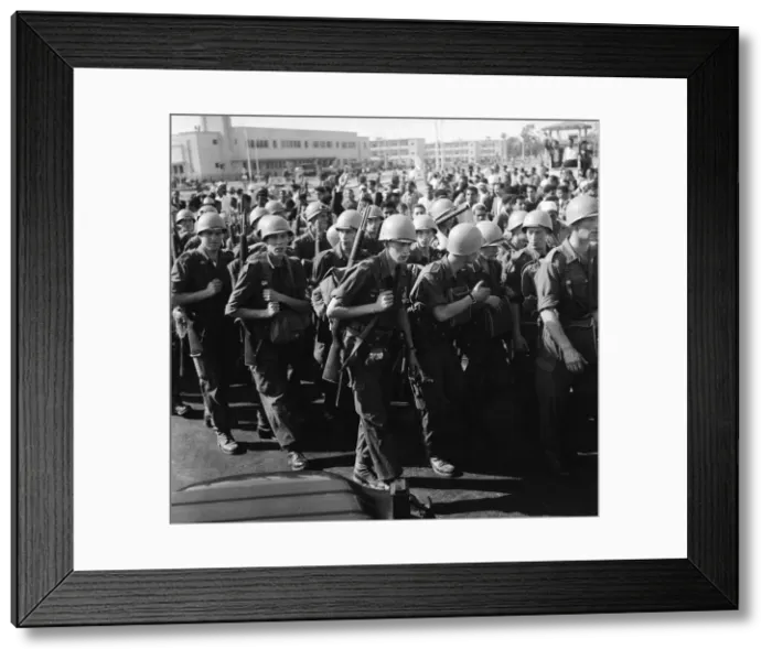 Framed Print : Suez Crisis 1956 United Nations troops march into Port Said past a restless Framed Print : Suez Crisis 1956 United Nations troops march into Port Said past a restless