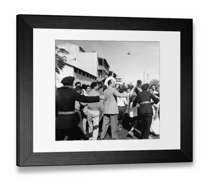 Framed Print : Suez Crisis 1956 Police keep crowds of gyptians back as United Nations troops march Framed Print : Suez Crisis 1956 Police keep crowds of gyptians back as United Nations troops march