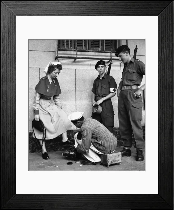 Framed Print : Suez Crisis 1956 British Army nurse Jean Leich has her shoes shined in Port