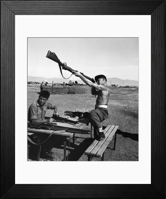 Framed Print : Suez Crisis 1956 British soldiers clean their weapons on an airfield in Cyprus