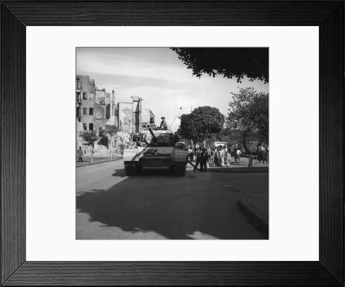 Framed Print : Suez Crisis 1956 A Centurion tank lends support to Commando troops who are carrying
