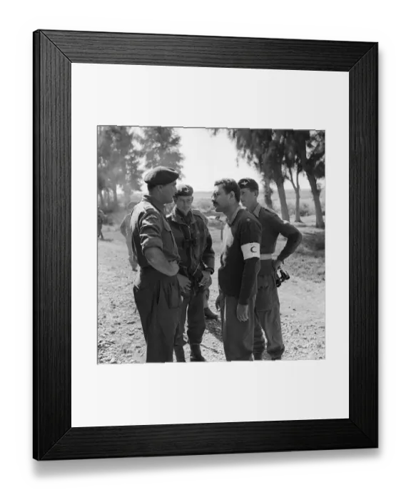 Framed Print : Suez Crisis 1956 A major in the Egyptian medical Corps discusses details of Framed Print : Suez Crisis 1956 A major in the Egyptian medical Corps discusses details of