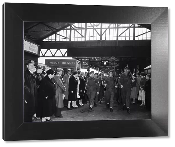 Suez Crisis 1956 Troops march form Portsmouth Train Station to the docks where they