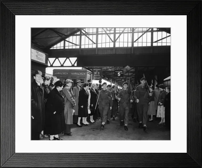 Framed Print : Suez Crisis 1956 Troops march form Portsmouth Train Station to the docks where they Framed Print : Suez Crisis 1956 Troops march form Portsmouth Train Station to the docks where they