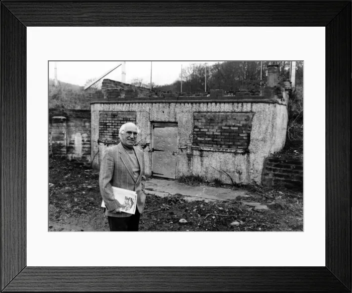 Framed Print : Taf Ely councillor, Mr Ivor Jenkins, outside the old well at Taffs Well
