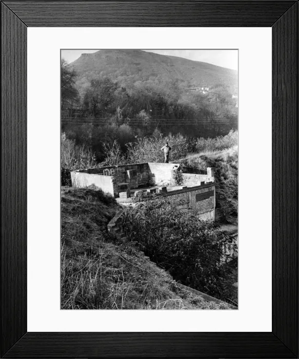 Framed Print : The old well, behind the bowling green at Taffs Well, now derelict and boarded up