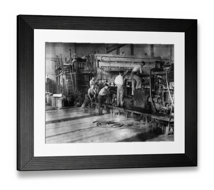 Framed Print : Bowater Paper Mills Ltd. Wet end of paper machine, showing new material passing over