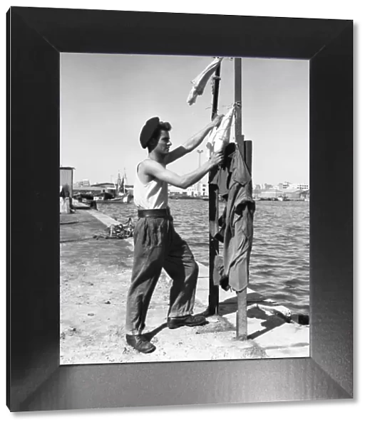 Suez Crisis 1956 Private Joe Lovelock of the Pioneer Corps hanging out the washing