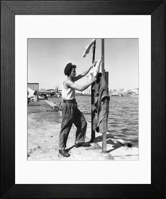 Framed Print : Suez Crisis 1956 Private Joe Lovelock of the Pioneer Corps hanging out the washing Framed Print : Suez Crisis 1956 Private Joe Lovelock of the Pioneer Corps hanging out the washing
