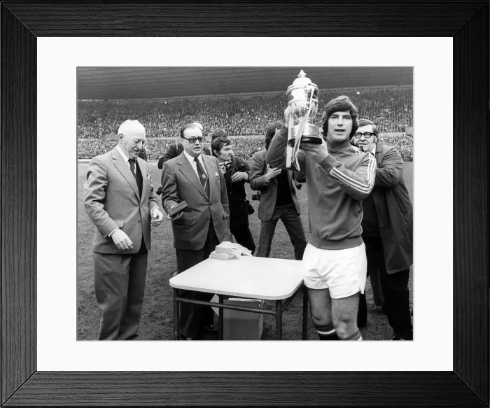 Framed Print : Manchester United captain Martin Buchan April 1975 holding the 2nd Second