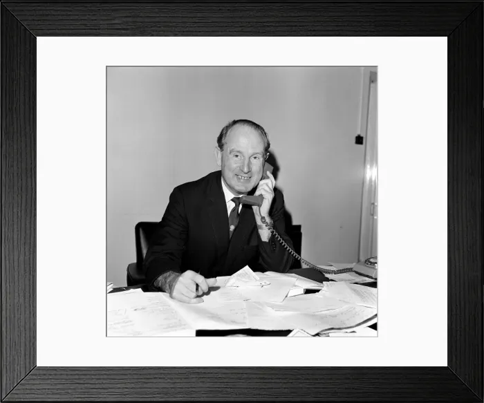 Framed Print : Football agent Ken Stanley reading a George Best annual. 18th February 1970 Framed Print : Football agent Ken Stanley reading a George Best annual. 18th February 1970