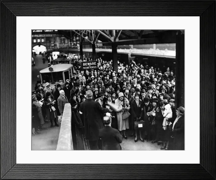 Framed Print : Pilgrimage to Lourdes. Scenes at Victoria Station. Hymns being sung before departure Framed Print : Pilgrimage to Lourdes. Scenes at Victoria Station. Hymns being sung before departure