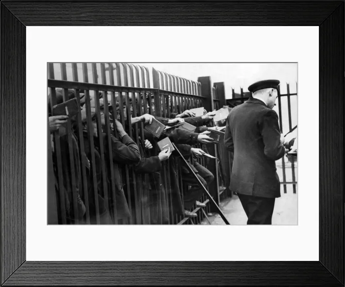 Framed Print : Unemployed sailors thrusting their discharge books through a landing-stage barrier Framed Print : Unemployed sailors thrusting their discharge books through a landing-stage barrier