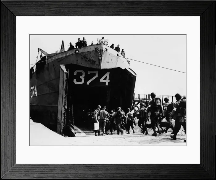 Framed Print : Members of a medical unit file aboard an LST. 7th June 1944