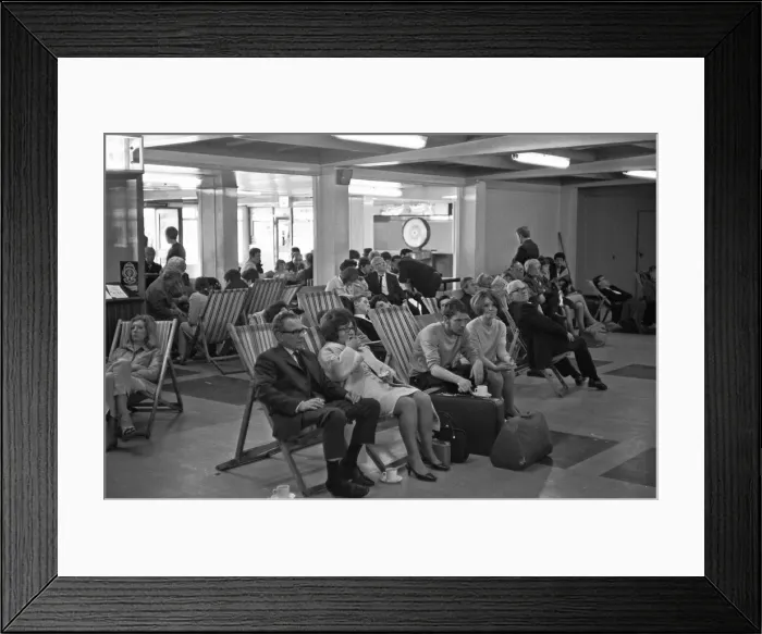 Framed Print : Holidaymakers waiting for their delayed flight to be called at Southend Airport 13th July Framed Print : Holidaymakers waiting for their delayed flight to be called at Southend Airport 13th July