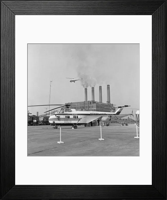 Framed Print : A Westland Whirlwind SRS. 1 helicopter G-APDY on the apron at the Battersea Heliport
