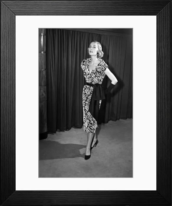 Framed Print : Model Audrey Wordsworth models a cocktail dress. 21st May 1954 Framed Print : Model Audrey Wordsworth models a cocktail dress. 21st May 1954