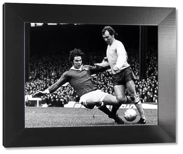 Bob McNab Football Player Arsenal Jan 1974 is tackled by Martin Buchan during a