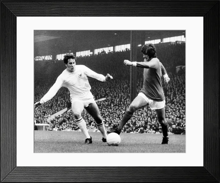 Framed Print : George Best of Manchester united sends Nottingham forest defender Hilley Oct 1969 Framed Print : George Best of Manchester united sends Nottingham forest defender Hilley Oct 1969