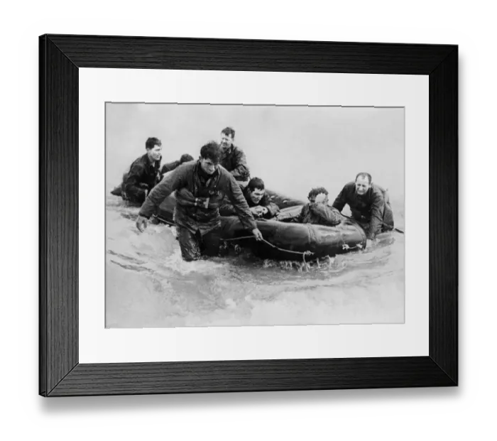 Framed Print : Survivors of a landing craft off the coast of France came safely ashore in a rubber life Framed Print : Survivors of a landing craft off the coast of France came safely ashore in a rubber life
