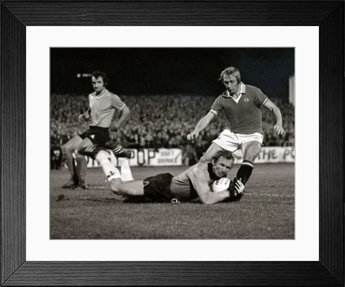 Framed Print : Manchester United v St Etienne - October 1977 goalkeeper saves as the striker