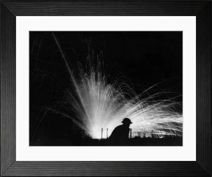 Framed Print : An exploding phosphorous round silhouettes a helmeted American soldier of the 28th Framed Print : An exploding phosphorous round silhouettes a helmeted American soldier of the 28th