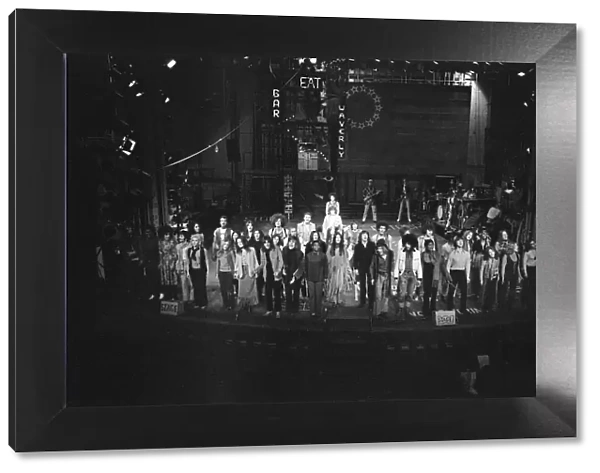 Picture shows the cast of Hair, The Musical. Far left is actor