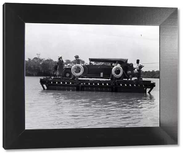 One of Carr-Hartleys cars arriving by Ferry after crossing the Zambezi river