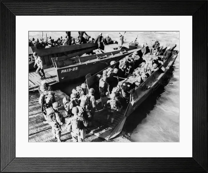 Framed Print : This picture shows American troops going aboard a landing craft during the successful Framed Print : This picture shows American troops going aboard a landing craft during the successful