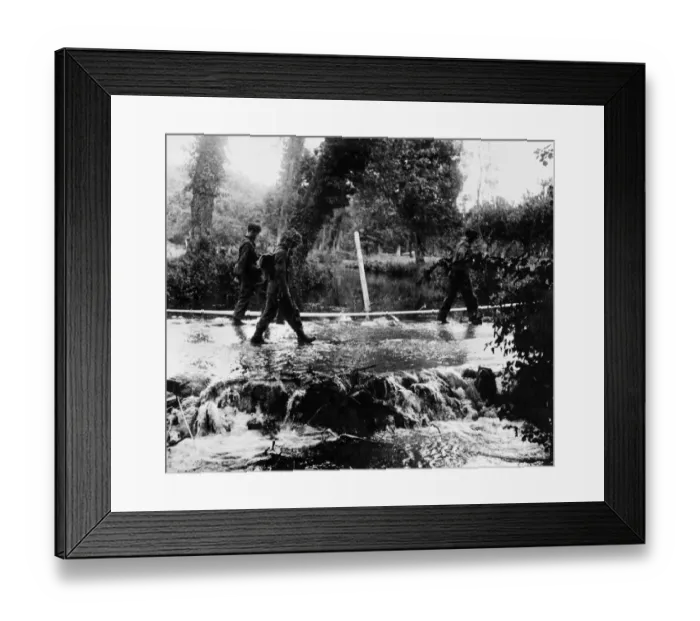 Framed Print : German snipers being escorted across the Odon river after capture in the Odon valley