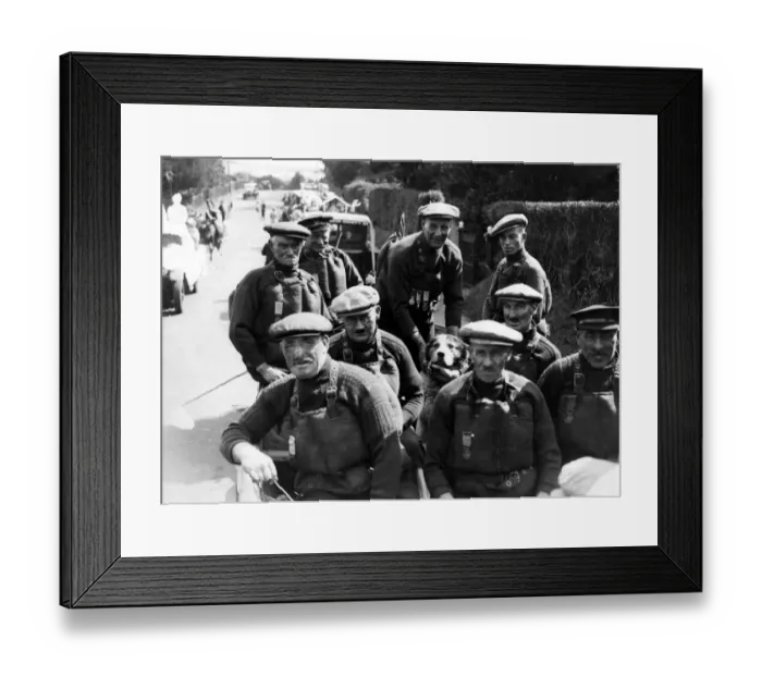 Framed Print : The Cromer lifeboat crew and the dog, Monte, they saved some years ago. They are H