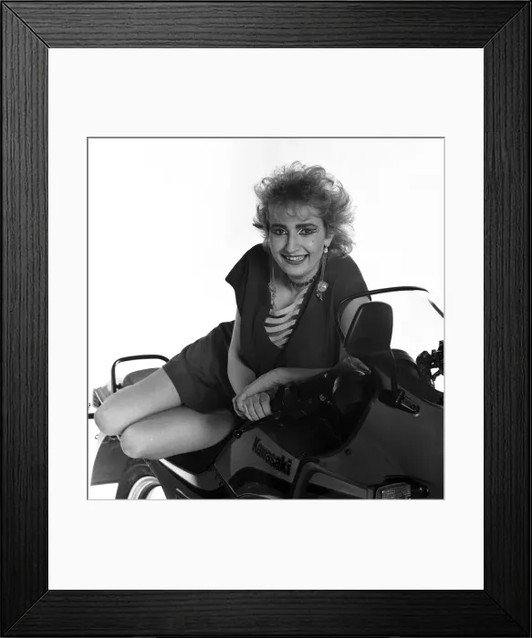 Framed Print : Su Pollard, pictured with a motorbike. January 1984 Framed Print : Su Pollard, pictured with a motorbike. January 1984