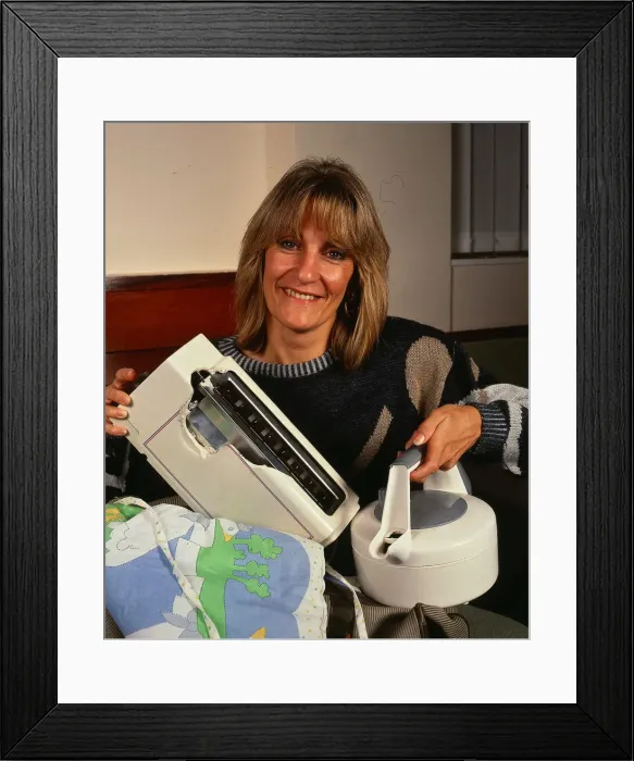 Framed Print : Lynne Faulds Wood with electrical goods October 1990