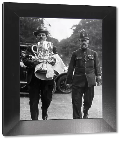 International Polo Cup, won by America. The lost cup. Carrying the Polo cup to