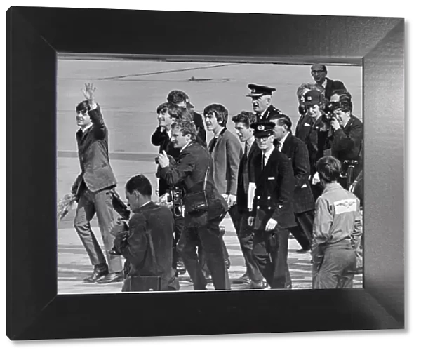 The Beatles arrive back to England after their first tour of America