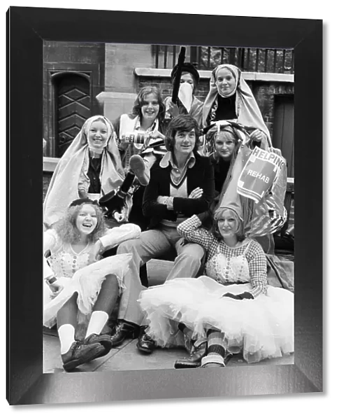 Michael Palin of the Monty Python team with girls from Sidcup during the charity Twits
