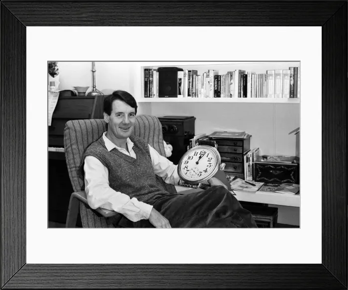 Framed Print : Actor and writer Michael Palin in his study at home. 7th November 1984