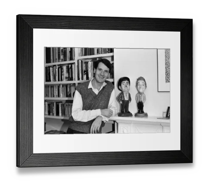 Framed Print : Actor and writer Michael Palin in his study at home. 7th November 1984